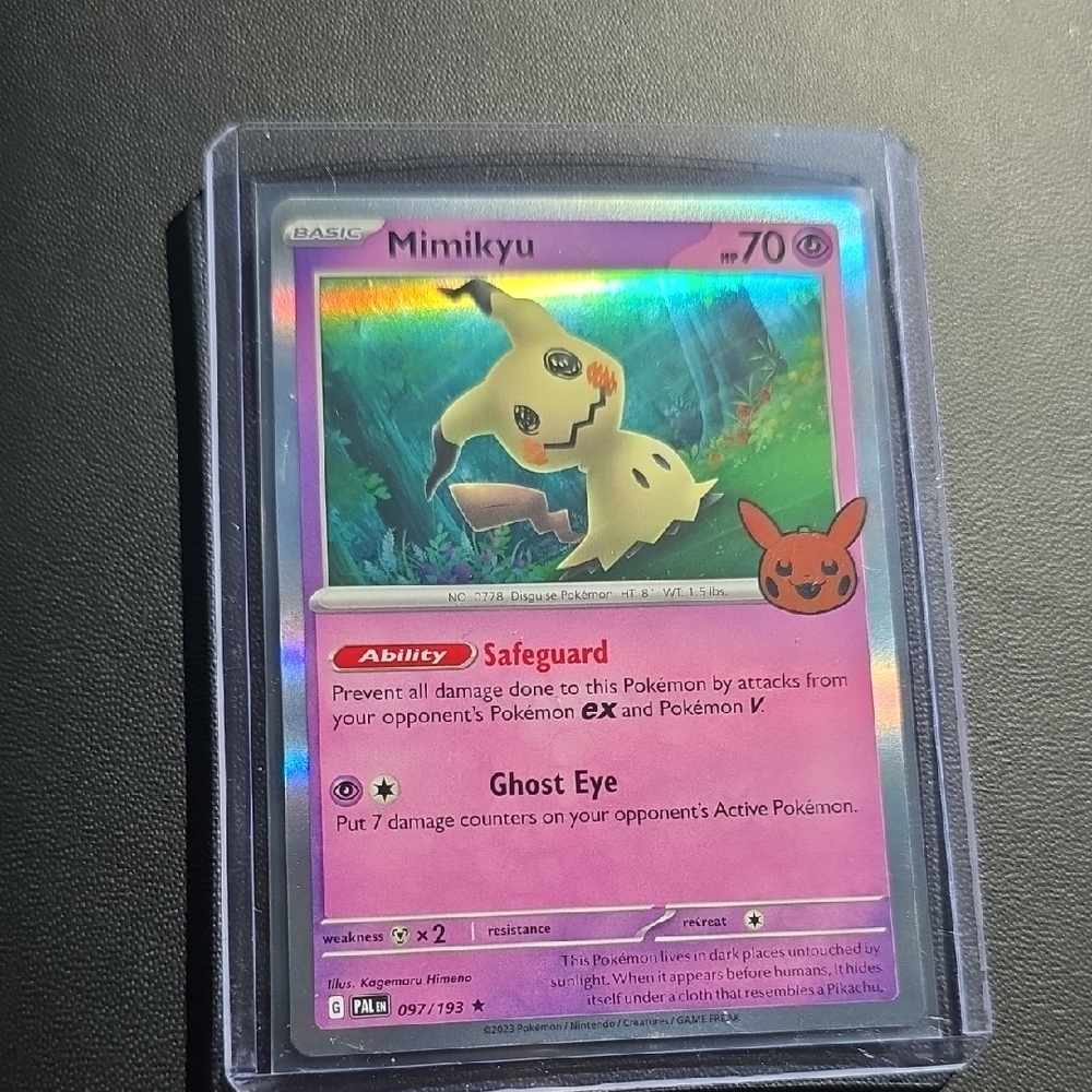 Mimikyu Pokémon Card with Holographic Design